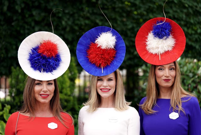 Royal Ascot racegoers turn heads on Ladies' Day with flamboyant hats and  show-stopping dresses