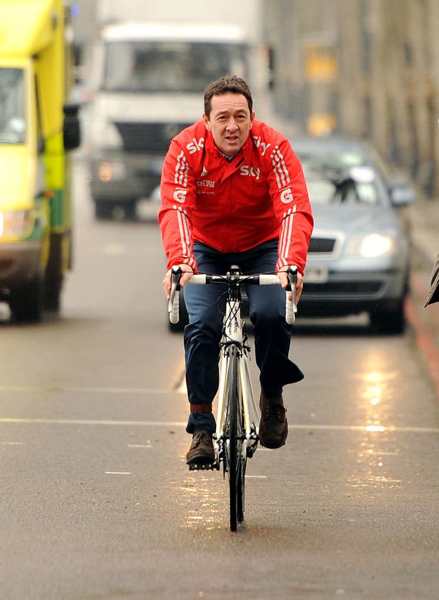 Chris Boardman on his bike in London