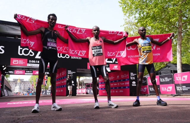 Sabastian Sawe (centre), Yomif Kejelcha (left) and Jacob Kiplimo (right) after the Men’s elite race 