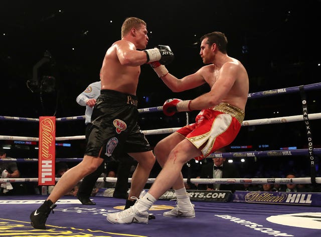 David Price, right, is knocked down by Alexander Povetkin