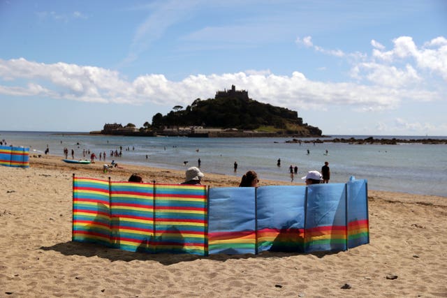 Places like Marazion and Saint Michael’s Mount in Cornwall are proving popular with holidaymakers (David Davies/PA).