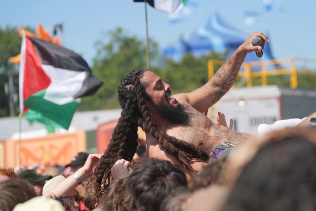 Bob Vylan crowd surfs during his performance on the West Holts Stage, during the Glastonbury Festival in Somerset