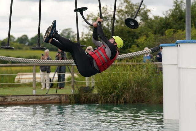 Liberal Democrats leader Sir Ed Davey falling into the water at an Aqua Jungle floating assault course at Spot-On-Wake in Henley-in-Arden, Warwickshire