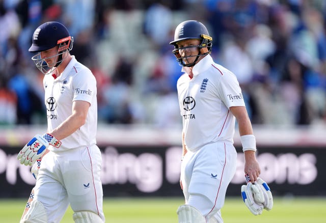 Harry Brook (left) and Ollie Pope walk off the pitch