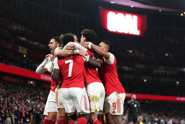 Arsenal players celebrate going ahead against Crystal Palace