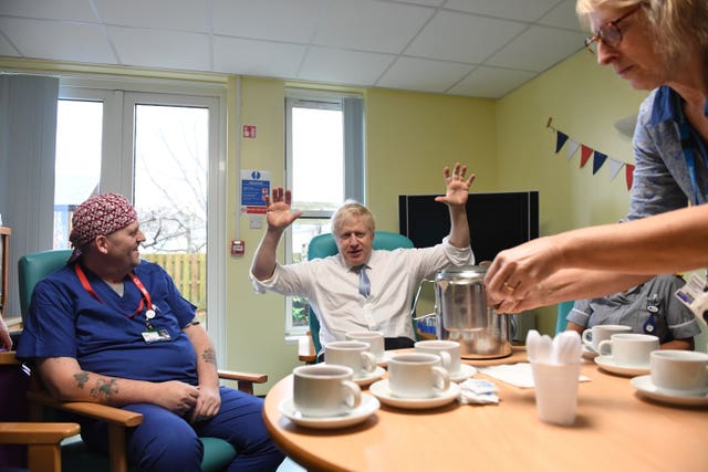 Prime Minister Boris Johnson has tea with staff at West Cornwall Community Hospital in Penzance