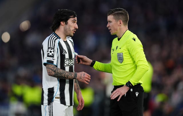 Newcastle’s Sandro Tonali speaks to referee Francois Letexier during the Champions League defeat at Barcelona