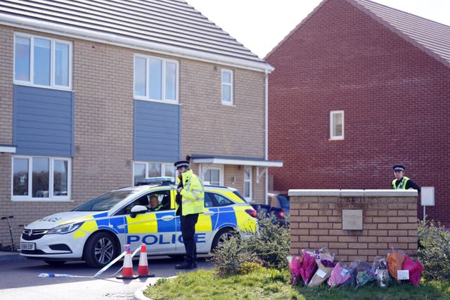 Flowers left at the scene in Meridian Close, Bluntisham, where police found the body of a 32-year-old man with a gunshot wound