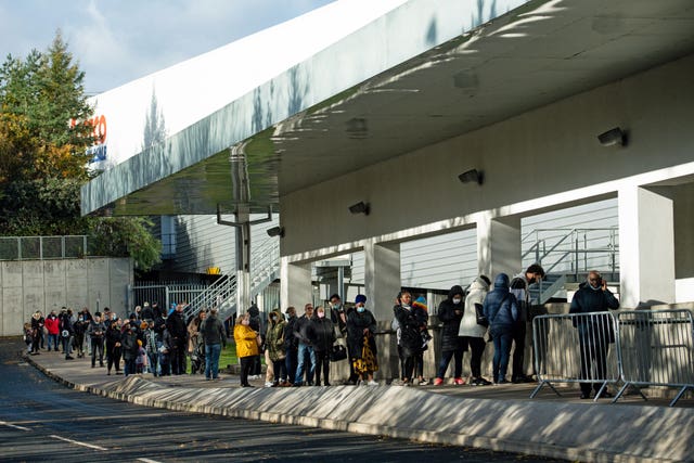 Shoppers queue outside a Costco store in Birmingham, ahead of a national lockdown for England from Thursday (Jacob King/PA)