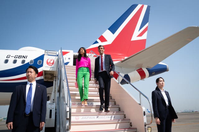 Rishi Sunak and his wife Akshata Murty arriving in Japan