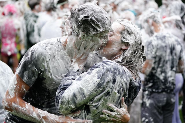 Hundreds of students take part in the traditional Raisin Monday foam fight on St Salvator’s Lower College Lawn at the University of St Andrews in Fife 