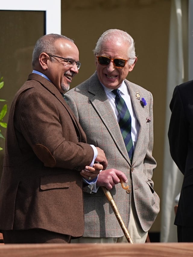 The Crown Prince and Prime Minister of Bahrain Salman bin Hamad Al Khalifa and the King share a laugh at the Royal Windsor Horse Show