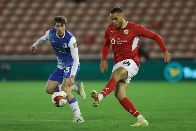 Barnsley’s Carlton Morris (right) 