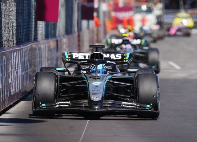 Russell drives his Mercedes