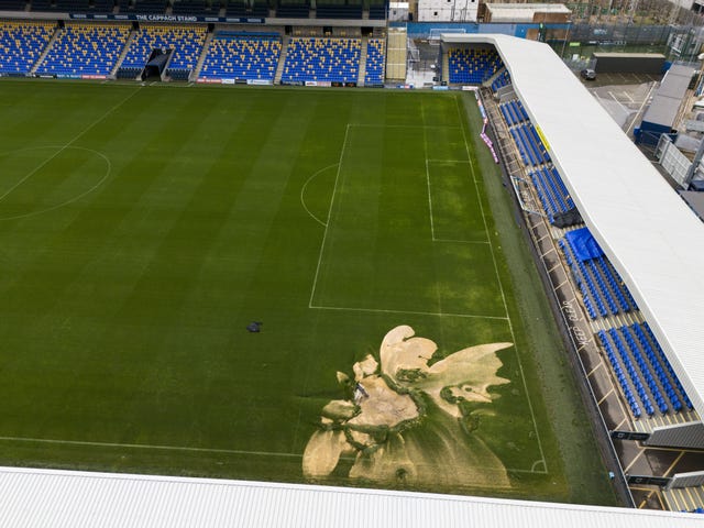 A sinkhole on the pitch at the Cherry Red Records Stadium, home of AFC Wimbledon