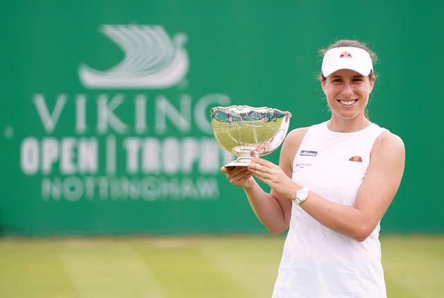 Johanna Konta holding the Elena Baltacha trophy after winning the Nottingham Open 