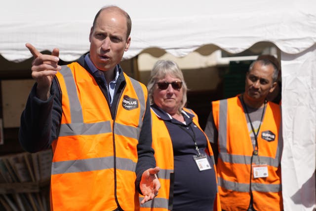 William visits food charity