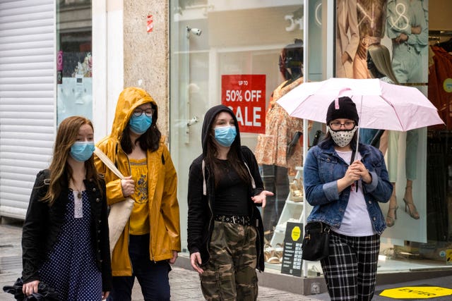 Shoppers in masks