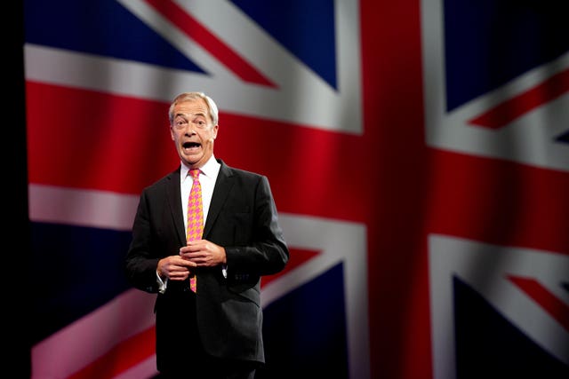 Reform UK leader Nigel Farage speaks at the party’s annual conference at the National Exhibition Centre in Birmingham 