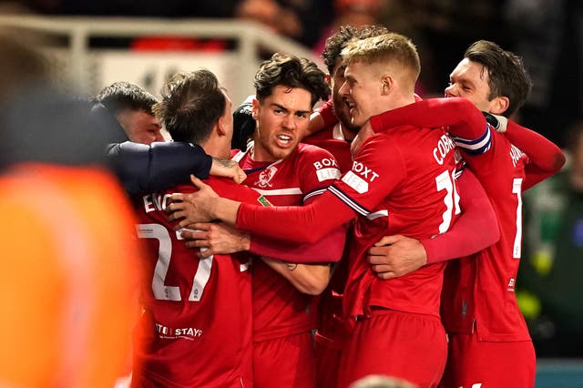 Hayden Hackney, centre, celebrates with team-mates after scoring Middlesbrough’s goal