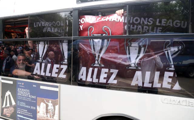 Liverpool FC fans on a shuttle bus taking them to the stadium (Steve Parsons/PA)