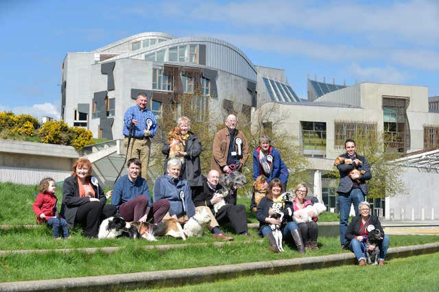 All the contestants with their canine companions (Sandy Young/PA)