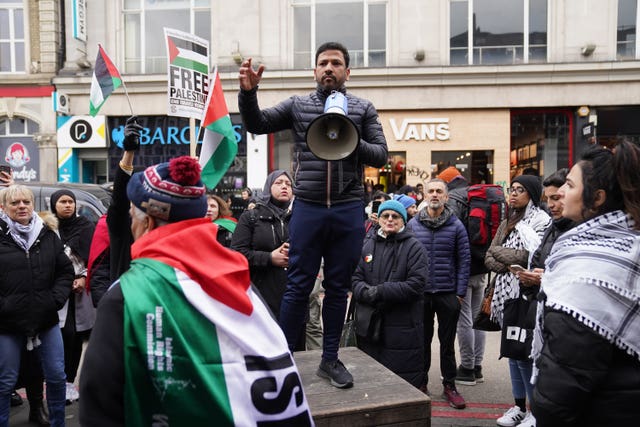 People take part in a protest as part of the Stop the War Coalition’s Day of Action for Palestine, in Camden Town (Stefan Rousseau/PA)