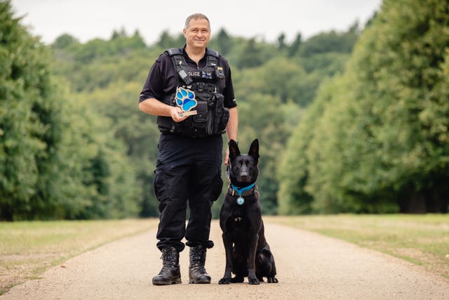 Pc Paul Hopley and West Midlands Police dog Stark