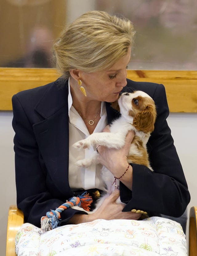 The Duchess of Edinburgh with Lord Louis of Spudringham during a visit to Dogs for Autism in Alton, Hampshire