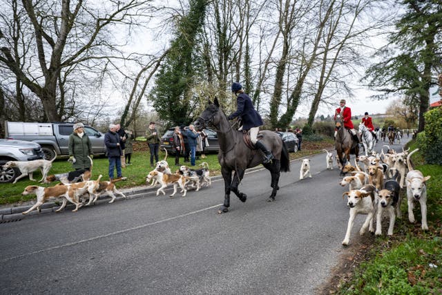 Riders and hounds during the Tedworth Hunt’s Boxing Day meet in Pewsey, Wiltshire