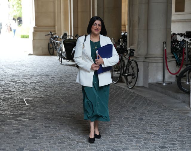 Shabana Mahmood walked outside, with folder under one arm