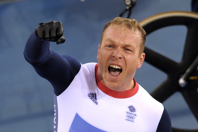 Sir Chris Hoy celebrating victory on the track