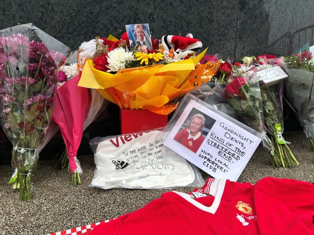 Tributes outside Old Trafford, home of Manchester United, in memory of Denis Law, following his death at the age of 84