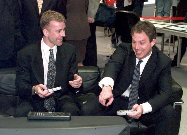 Tony Blair playing a computer football game (Sean Dempsey/PA)