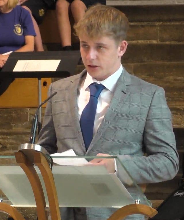 Ms James's son Patrick Davis pays tribute to his mother during the service 