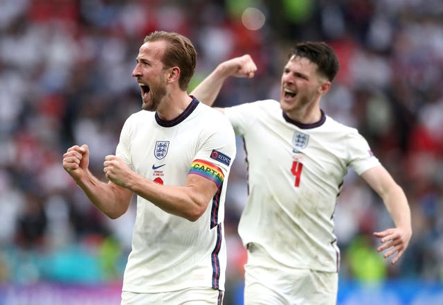 England’s Harry Kane and Declan Rice celebrate after the final whistle