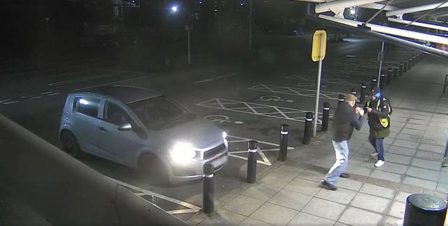 Trevor Weston fights off Michael Collins during the attempted robbery outside Sainsbury's (South Wales Police/PA).