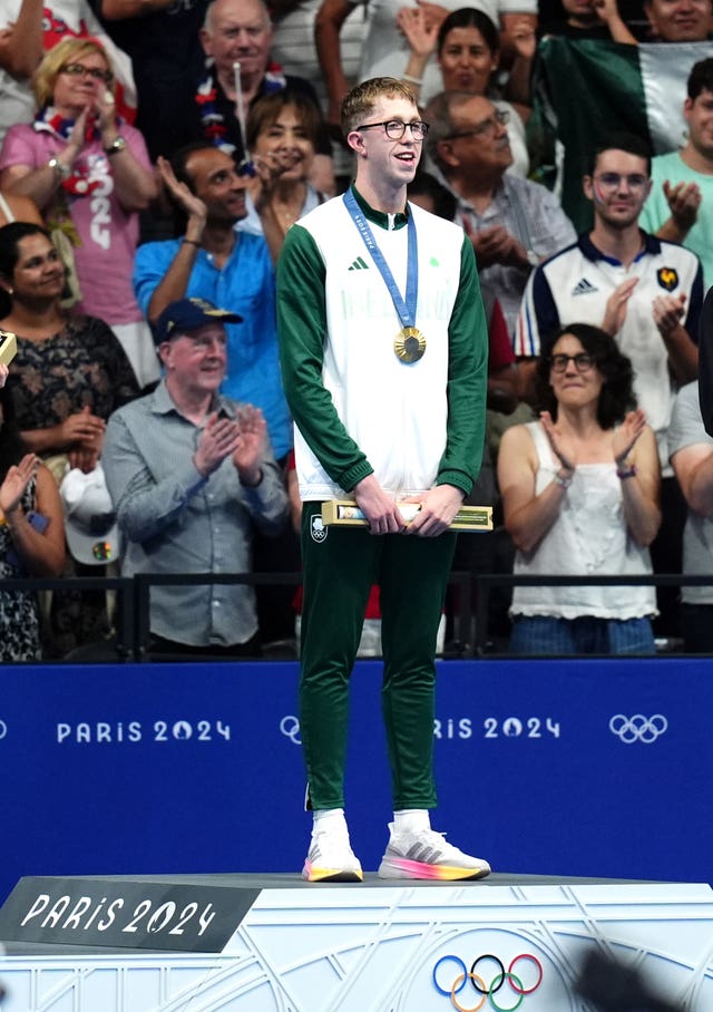 Ireland’s Daniel Wiffen stands for the national anthem after winning the men’s 800m freestyle final