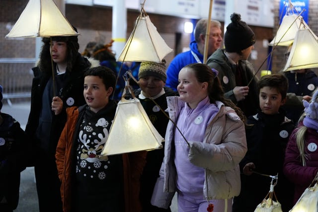 Children walked with lanterns to the Spellow Community Hub and Library on Wednesday night 