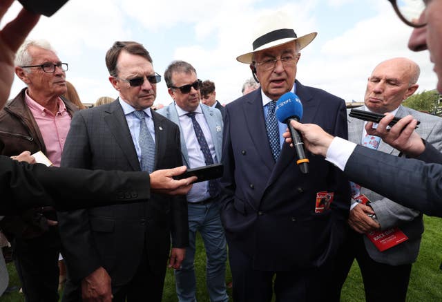 Aidan O’Brien and John Magnier (left) were both delighted to see City Of Troy win at Sandown 