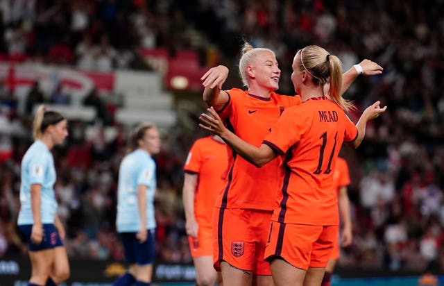 Beth England, left, and Beth Mead celebrate England''s sixth goal