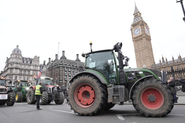 Tractors are lined up outside the Houses of Parliament