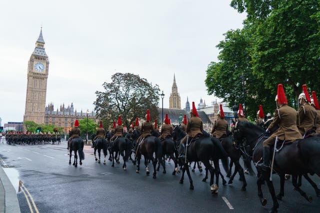 Troops of the Household Cavalry in Parliament Square, London, as members of the Royal Navy, British Army, and Royal Air Force conduct a final early morning rehearsal through London ahead of Sunday’s Platinum Jubilee Pageant, which will mark the finale of the Platinum Jubilee Weekend