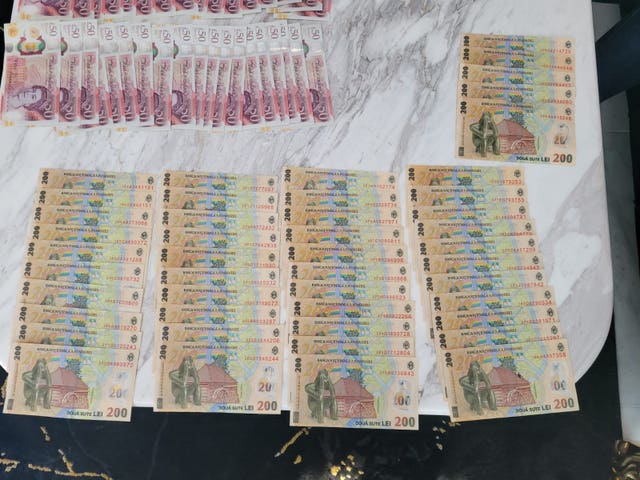 Cash seized during raids in the two countries 