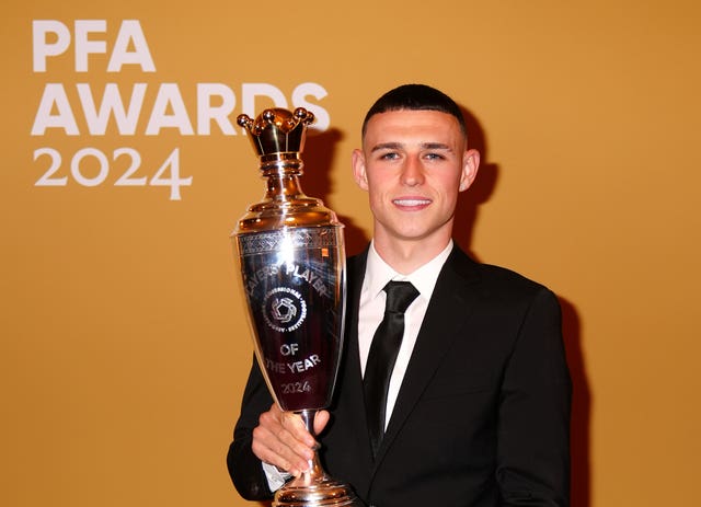 Phil Foden with his 2024 PFA player of the year trophy