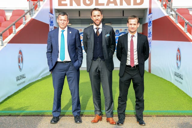 New England manager Gareth Southgate, with Martin Glenn and technical director Dan Ashworth (right), following a press conference at Wembley Stadium
