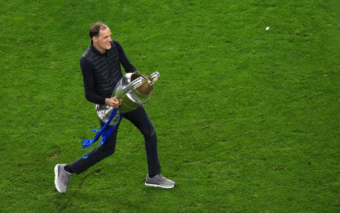 Thomas Tuchel celebrates with the Champions League trophy