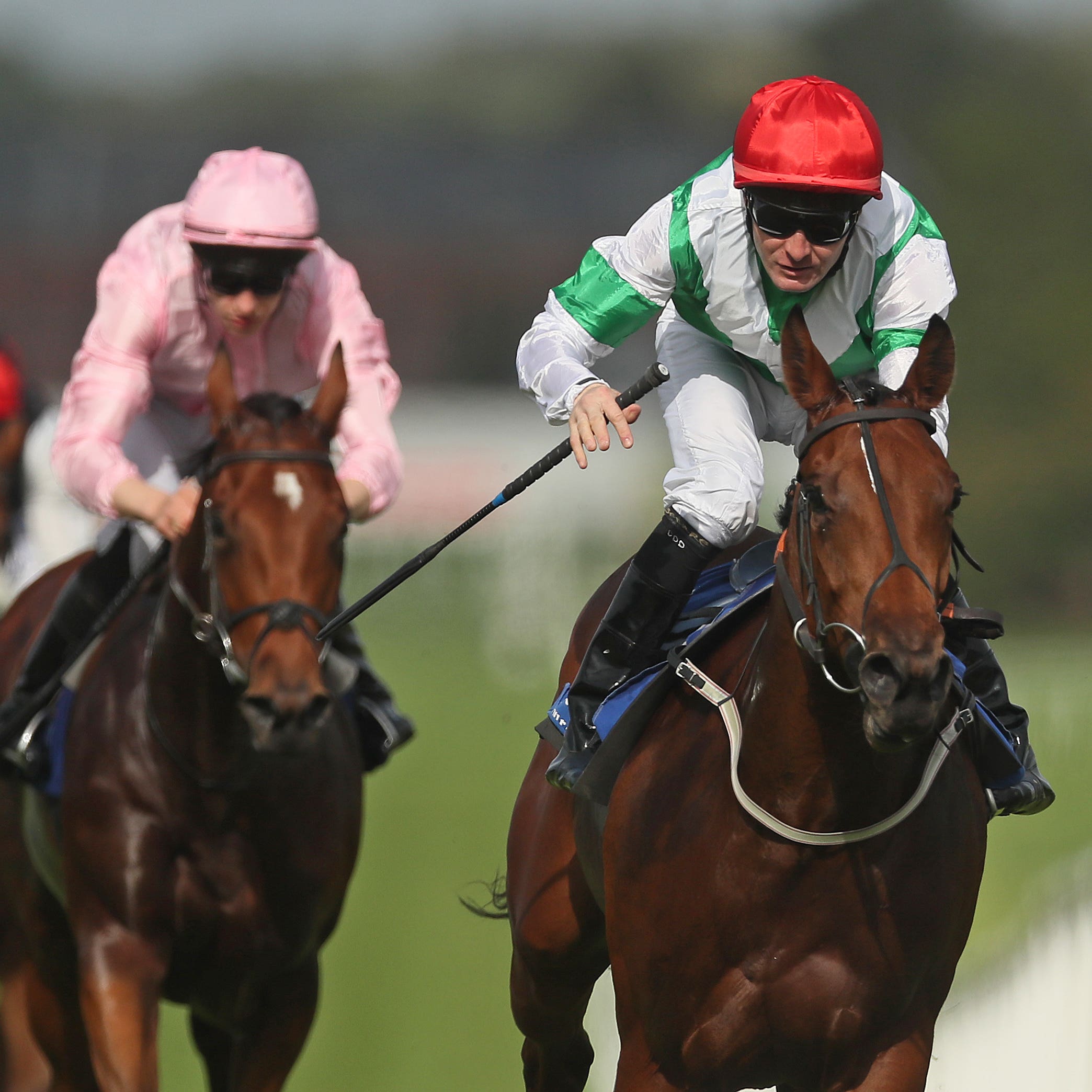 Ellthea (right) on her way to winning at Naas