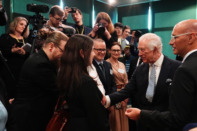 Charles meeting members of the community during his visit to the Jewish Community Centre Krakow