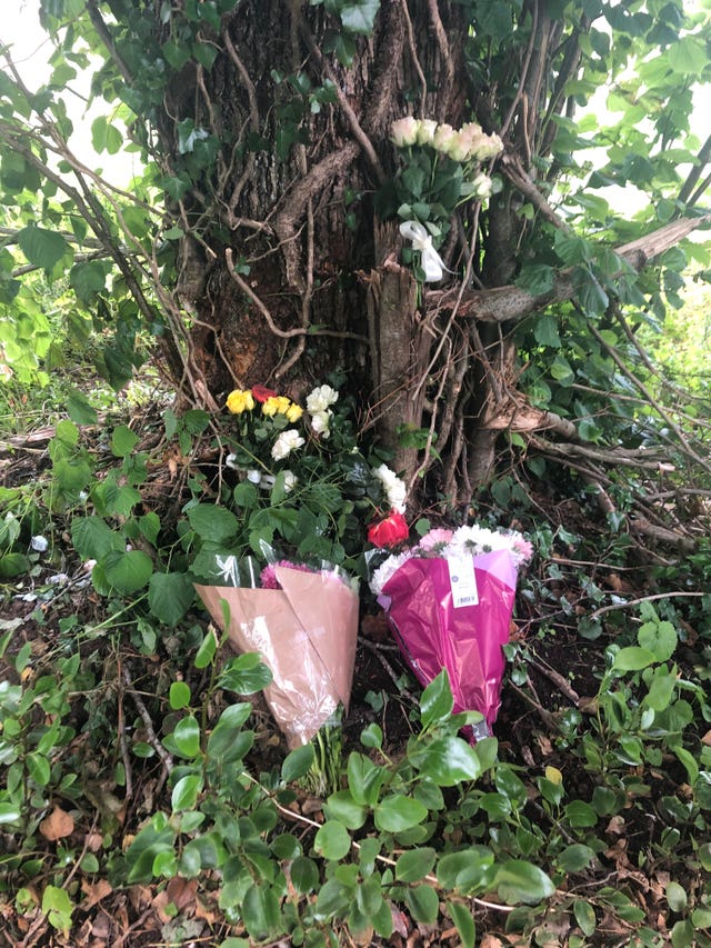 Floral tributes left at the scene of the crash